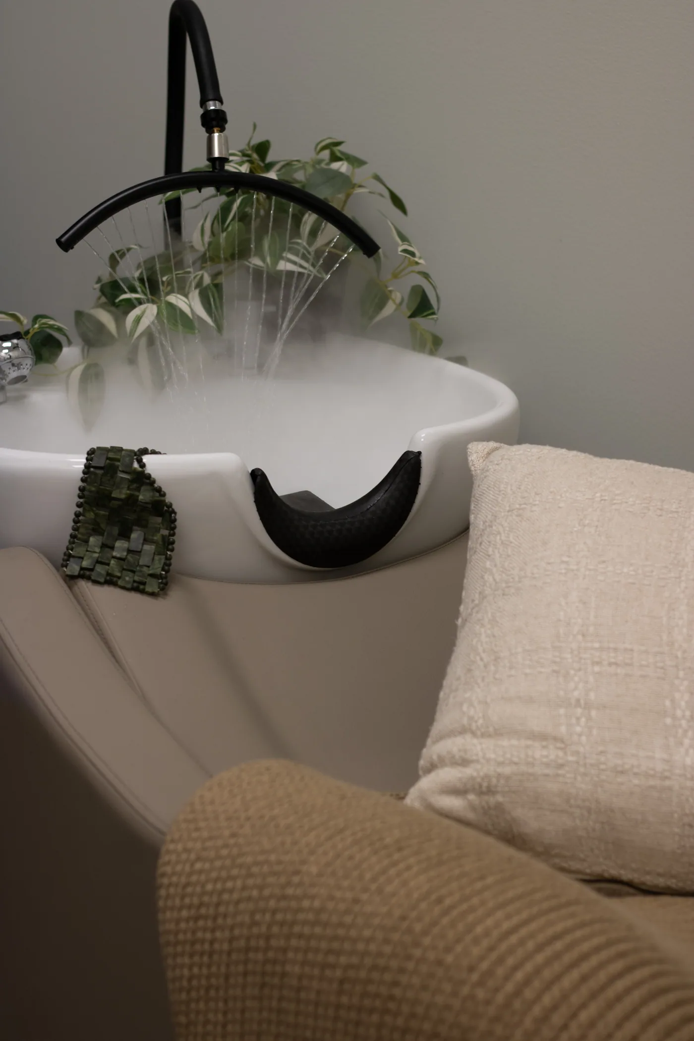 Scandinavian-inspired head spa basin during a scalp treatment at The Beauty of Zen organic salon, Worcester MA